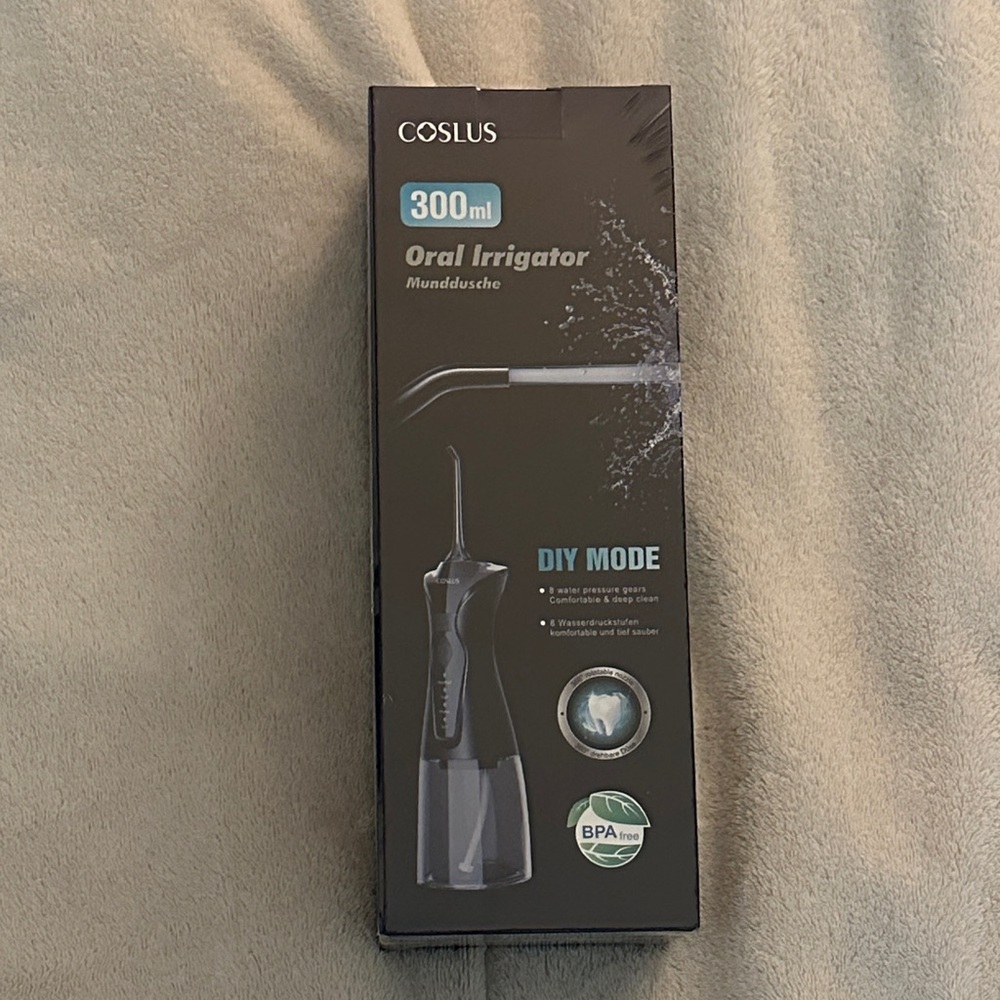 COSLUS Water Flosser - Oral Irrigator 300ml - White